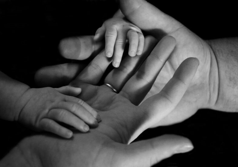 parents and child hands